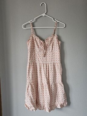 Hollister Sleeveless Floral Ruffle Sundress in Peach